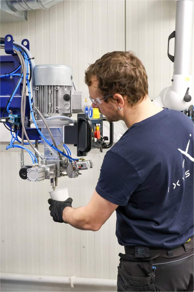 Automated mixing machine used for blending polyether polyols in Ixys subsea cable production.